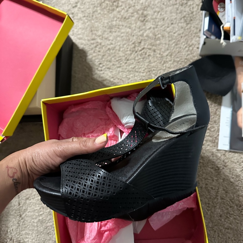 Black leather wedge heels